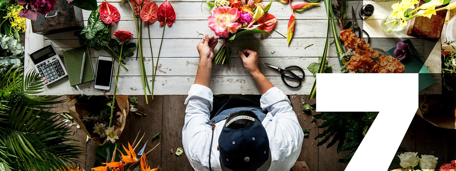 person cutting flowers