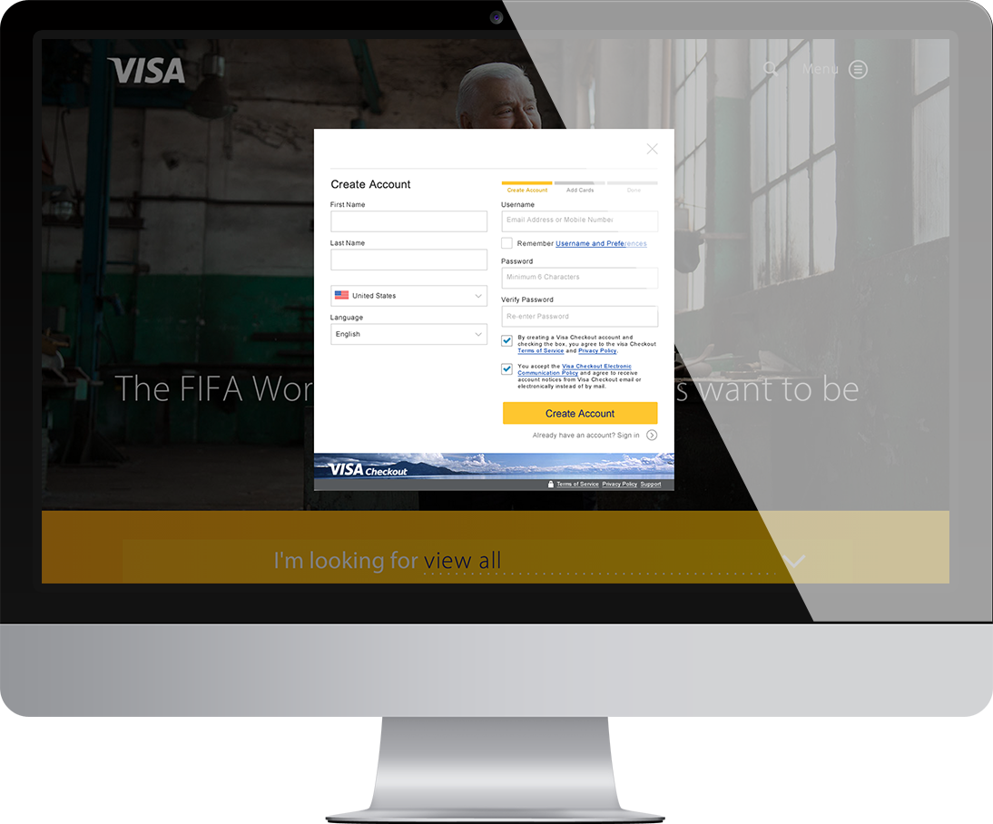 A computer monitor displaying a Visa Checkout enrollment form.