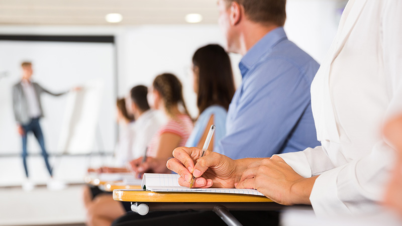 Female hand with pen